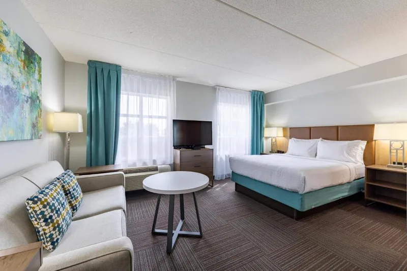 A hotel guest room furnished with Nerval case goods